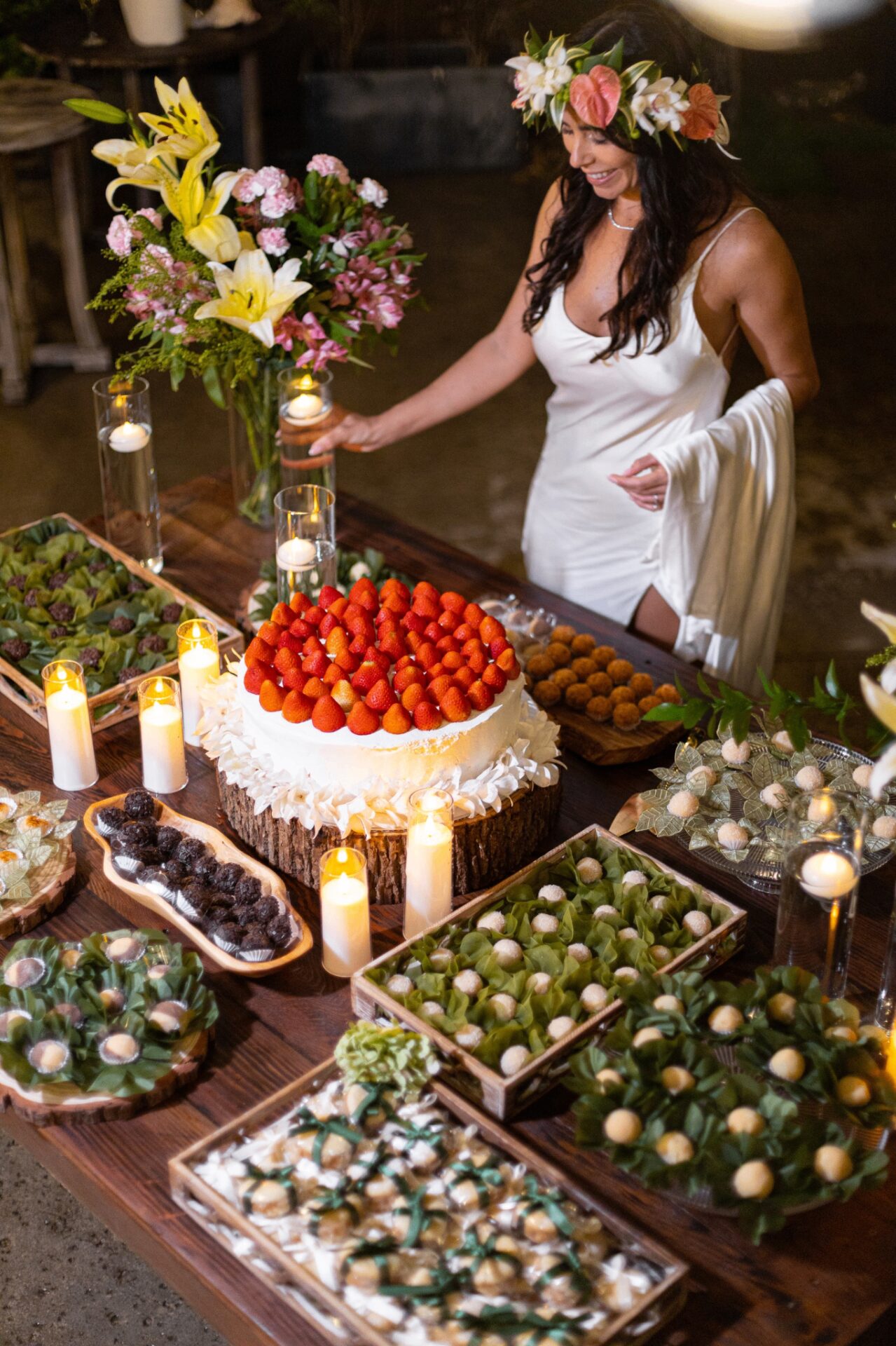 Amanda, founder, at her wedding dessert table